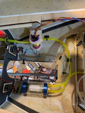 Fuel system plumbing almost done.  Kept all this on fuse bottom with pump mounted vertically on the right side. Keeping everything ahead of CG. Still need to mount vent in bottom of fuse