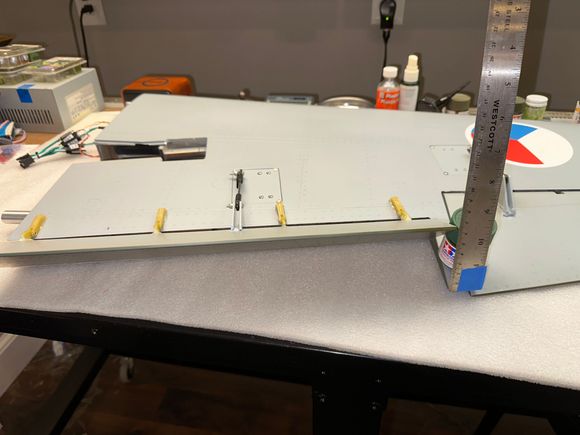Flap throw measured at outboard location