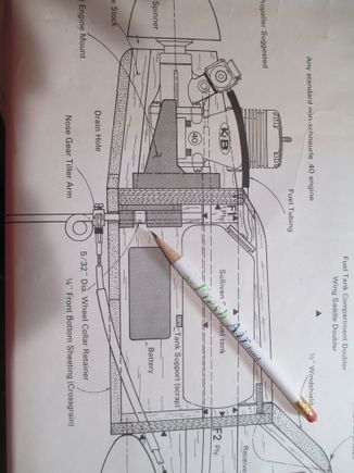 Don't know why some of these photos come out on the wrong angle.  The pencil is pointing to the part that secures the nose wheel shaft to the firewall.  The problem that I ran into was there were two blind nuts in that location that prevented the nose gear mount from sitting flush.  Nothing is ever easy...