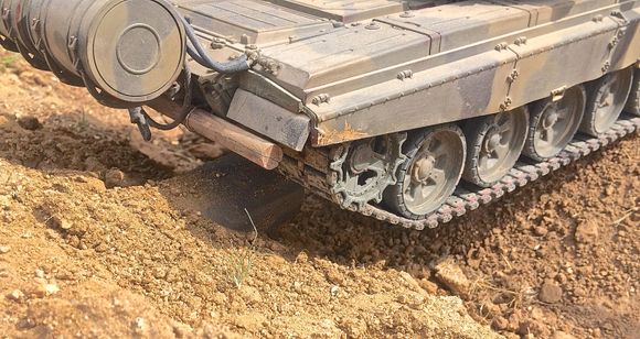 Above Heng Long T90 high centered on drain pipe. One of many time it had to be recovered.