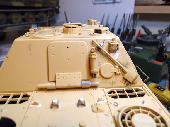 Fire extinguisher will be held on with magnets, shovel can be removed means i can tools on or off.