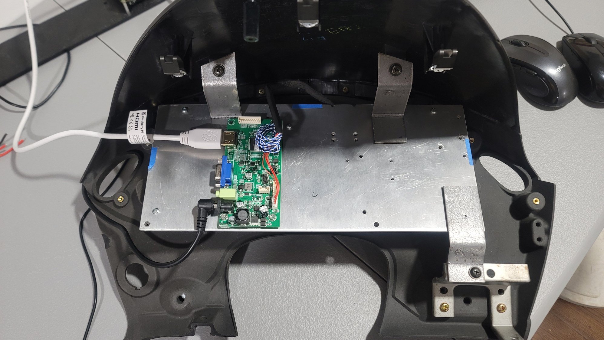 I had to move the board because one corner was resting on the mount bracket and I think it might have shorted the board by making contact with a couple pins.  The screen went dark and the only thing that worked was swapping the board.  I have this whole thing mounted now, so all the bolts are in, but I still need that fourth bracket.