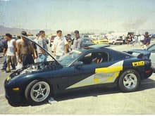 old school pic of adam's rx7 side view