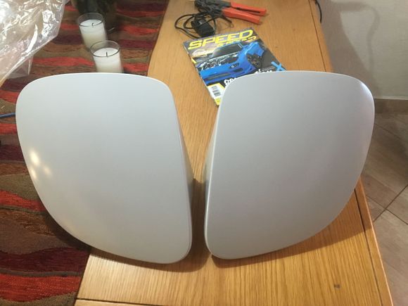 On a positive note my Brand new OEM Mazda headlight covers finally arrived 