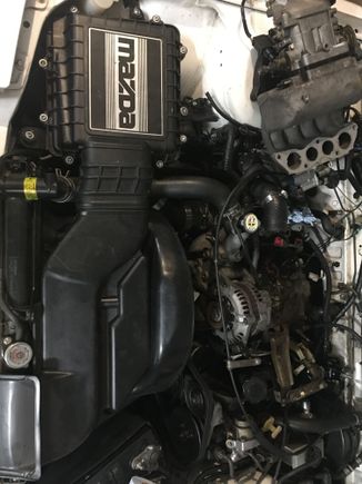 Factory air box retained 