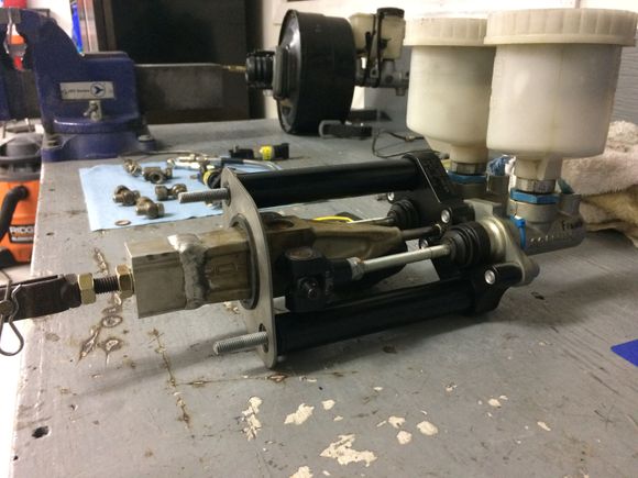 Cut off the stock shaft and adapted the rx7 clevise with a chunk of aluminium .