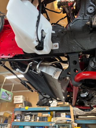 New wiper and coolant fluid reservoirs. New hoses and pump