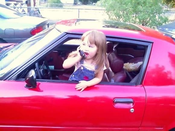 Grand Daughter practicing being a teenage driver.