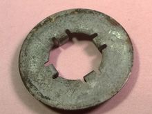Rear caliper bracket washer.