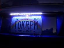 LED strip to light up the license plate, powered by the original 12v lighting wiring.