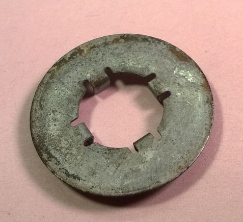 Rear caliper bracket washer.