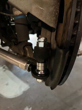 Driver side using the new grade 8 nut and their cheap on on top to lock in place