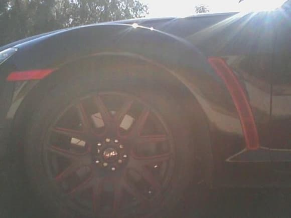 Red Corner Lights, New Rims, Red Vents
