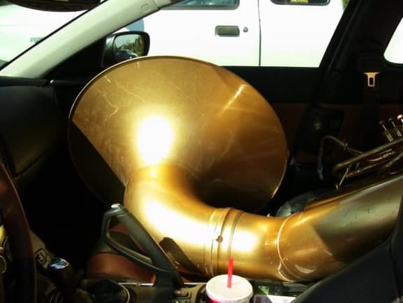 Yep, that's a susaphone (Tuba).  Try that in any other sports car.