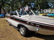 Yes, it's a boat on a car chassis. Yes, it's a street legal motor vehicle. Yes, it was driven to CTC from somewhere in Louisiana.