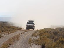 here he comes out of the dust