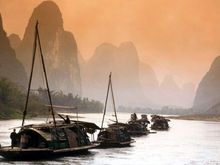 b li river boats in a row at sunset.jpg