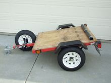 Tire trailer with storage box removed.