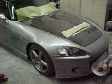 buffing the front spoiler.JPG