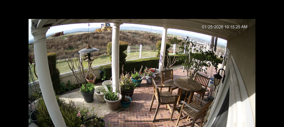 1-25-2026.  CA behind house.