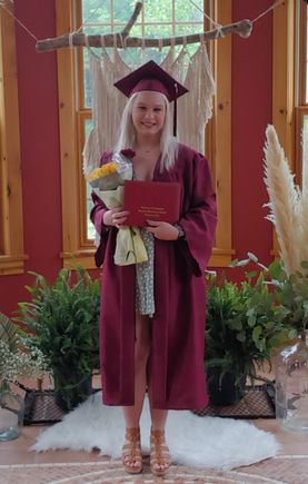 Anika with her diploma. 