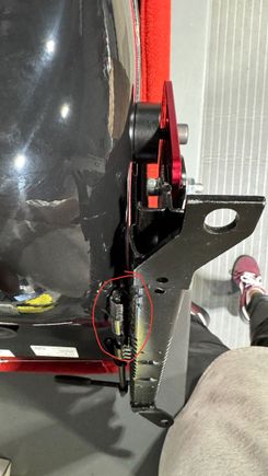 you can see the bar/spring circled in red hitting the seat. This is even with the spacers being used which can't actually be used with this seat and actually fit in the s2000. Im just showing the even with spacers theres no way this will work. 