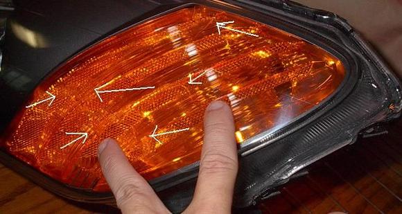 Hung Ly Shattered Amber OEM diffuser on Drivers side.jpg