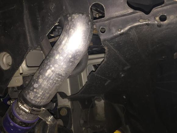 Slight trimming of fender liner for intercooler piping to fit.