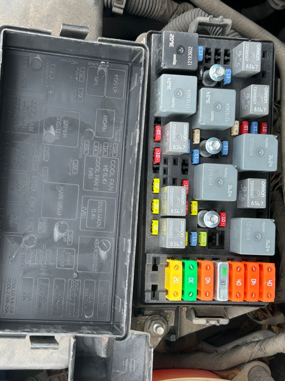 Fuses/relays for under hood next to the battery terminal 