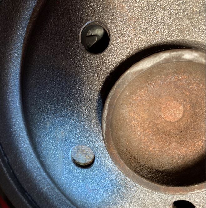 Adjuster lever through hole