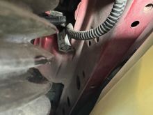 Frame rail next to coolant reservoir 