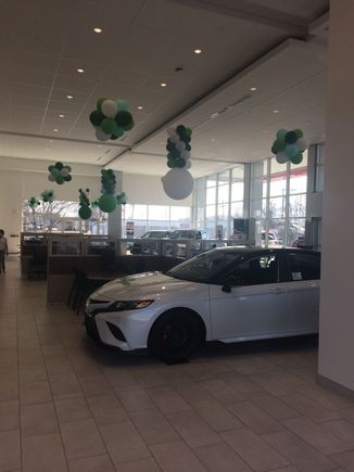 This picture screams that the customers must pay the price of this nice place. Must be even more expensive to buy here a car!!! Also in all this show room/area or outside I can not see a car that have the shape and form of a Scion xB 2004. 