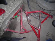 powers cage for 600rr  cut and start to weld new mounts due to shit ass design in stock mounts  just needs to be finished