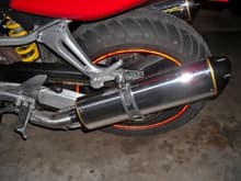 The s-curved adapter pipes are mounted closed to the bike than the old LV pipes were. So close that there is a dimple in the pipe to clear the chain.