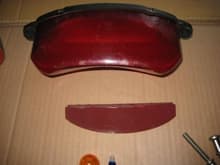 tail light housing with spare bottom plate