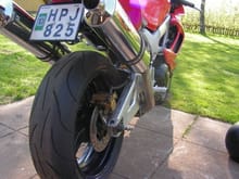 CBR 600RR rear wheel, RC51-SP2 swingarm and brake caliper &amp; mount. (The position for the brake line is reversed, stock caliper does NOT fit.)