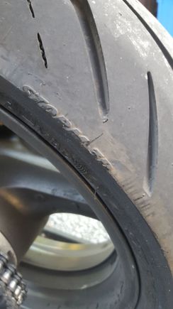 I put 3 - 4000 kms on this new tire before i started to notice slight wear. I thought it was an aftermarket metal chain guard I had installed, so I switched it back to the stock plastic one.