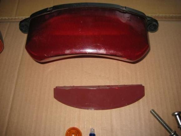 tail light housing with spare bottom plate