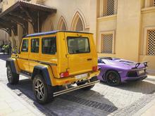 Solar beam yellow Mercedes-Benz G500 AMG 4×4² and matte purple Lamborghini Aventador Roadster. Both supercars owned from Saudi.