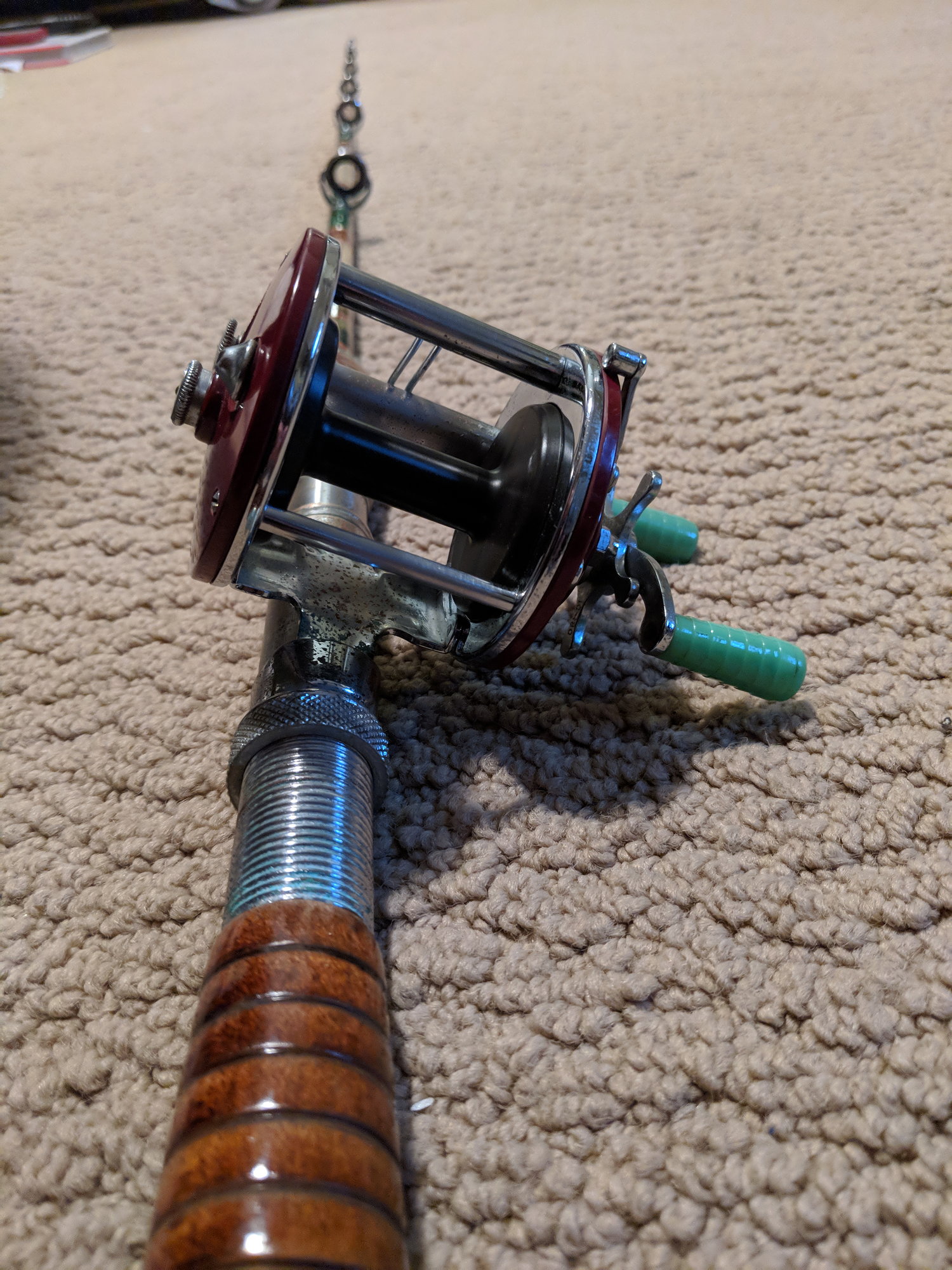 Can anyone help me ID this (possibly vintage) fishing rod? The