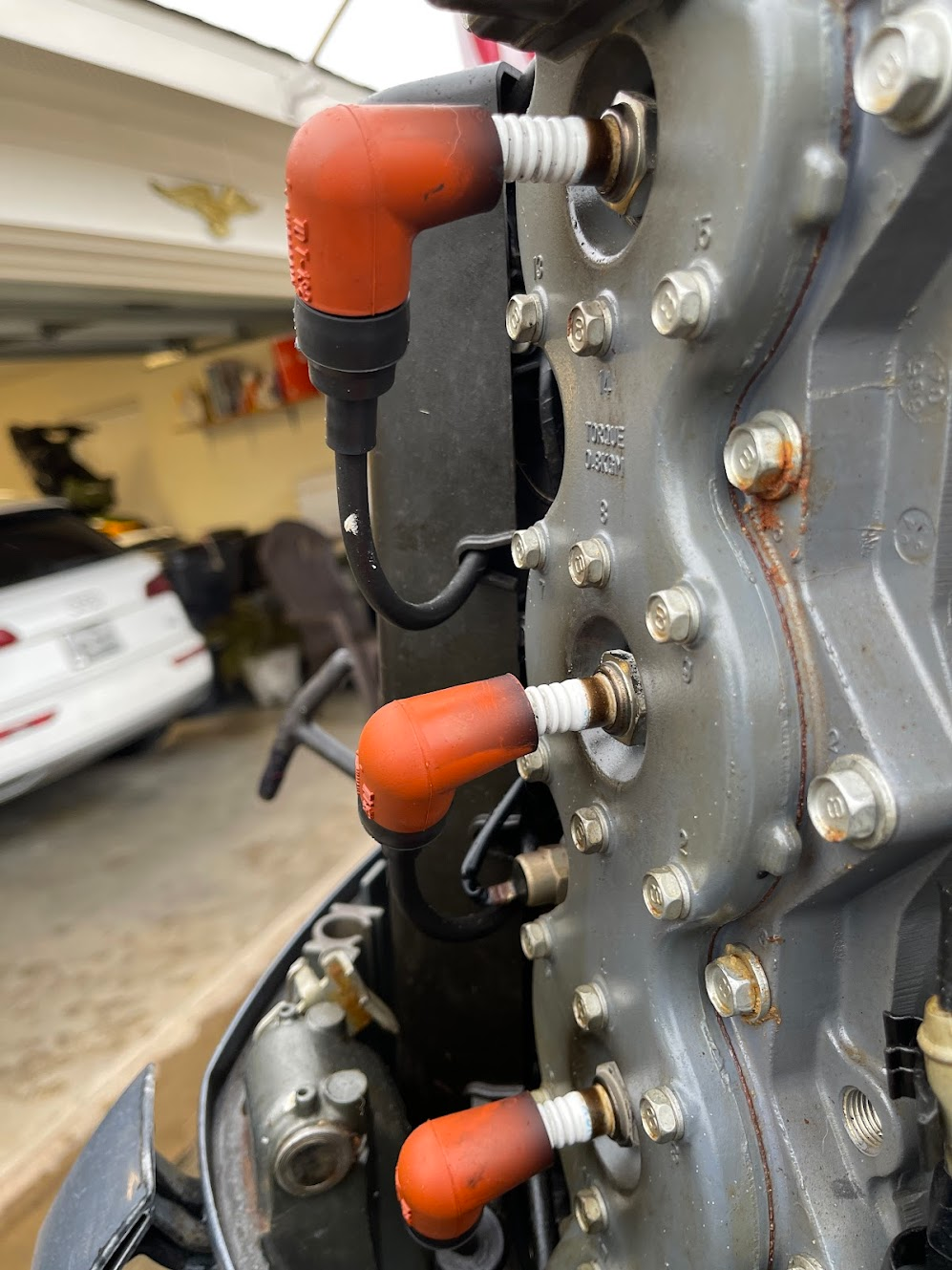 Black ring around outside NGK spark plug Yamaha 150 2 stroke outboard