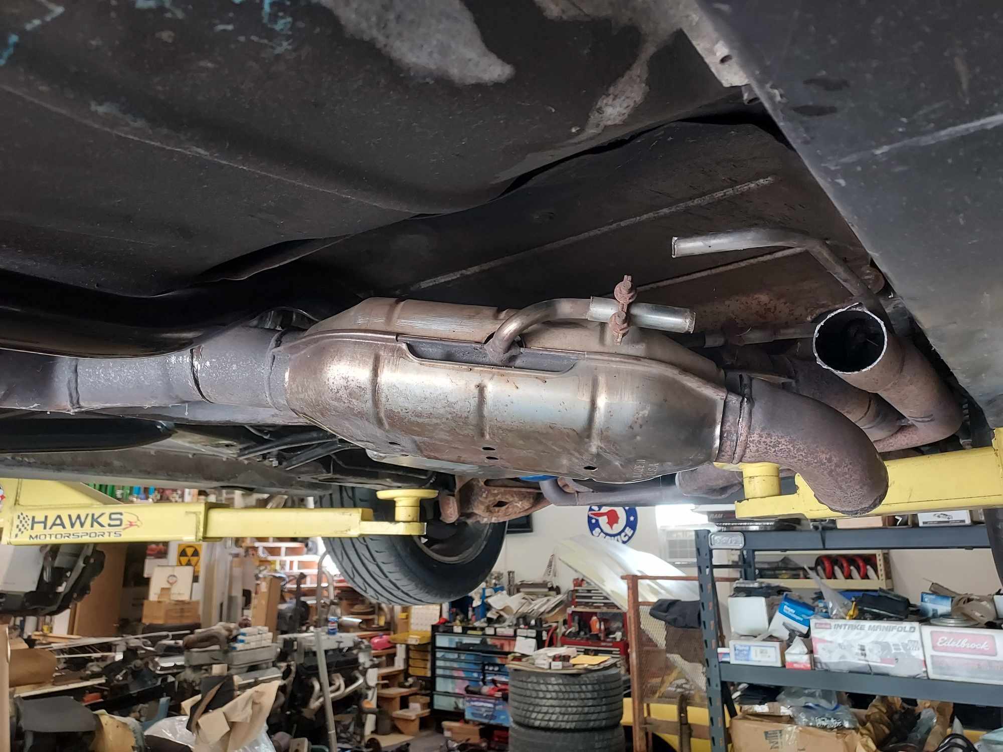 Cut on the correct welds and it comes right out. Put it back in, weld the welds and it's hard to tell its been messed with.  (Has slp  tri-y headers)