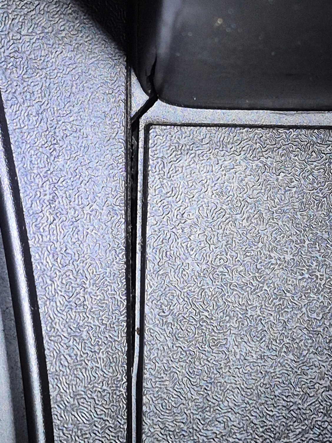 Another slightly bigger hairline crack following down this groove