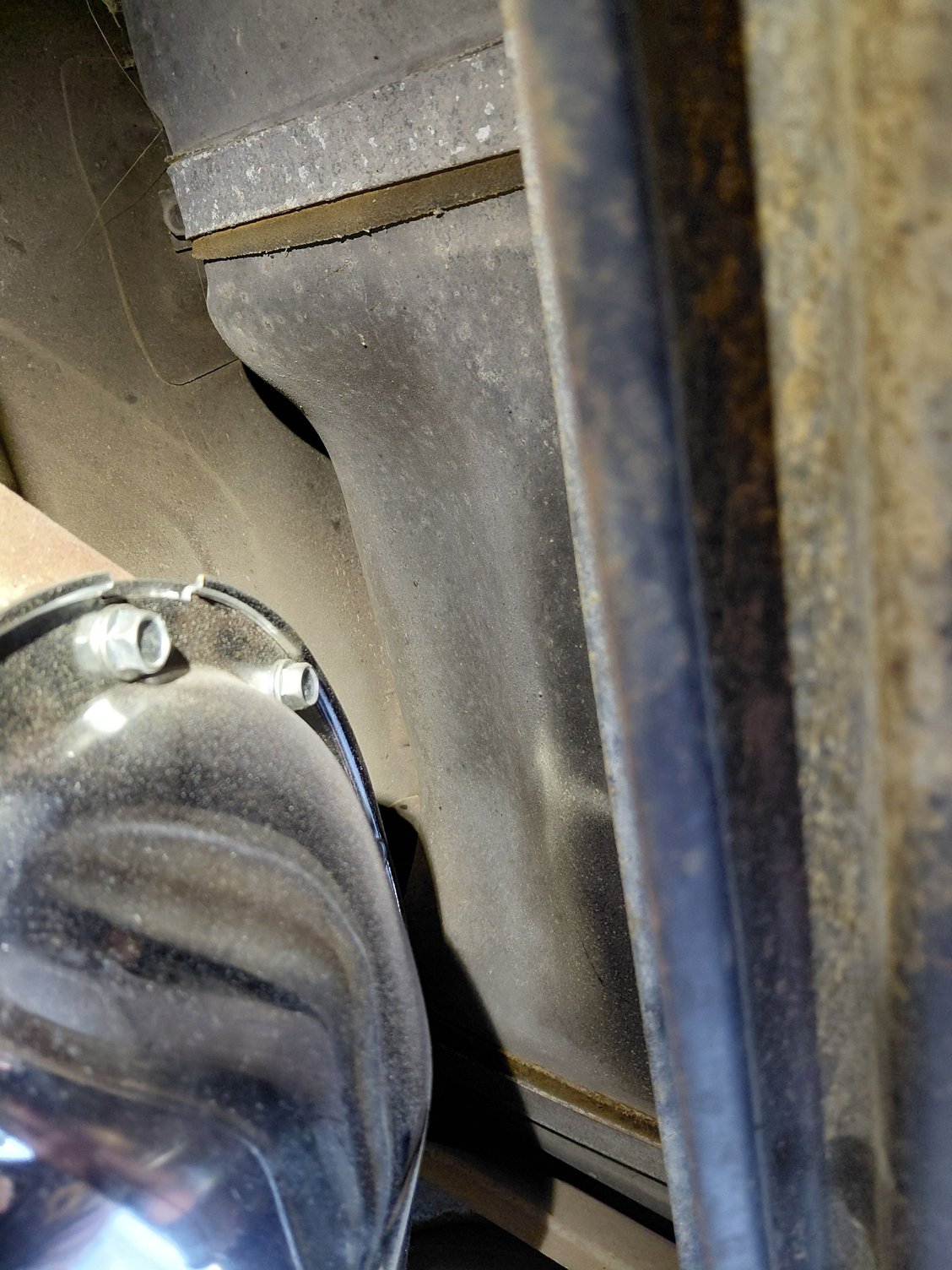 Directly beneath fuel-tank/diff looking up