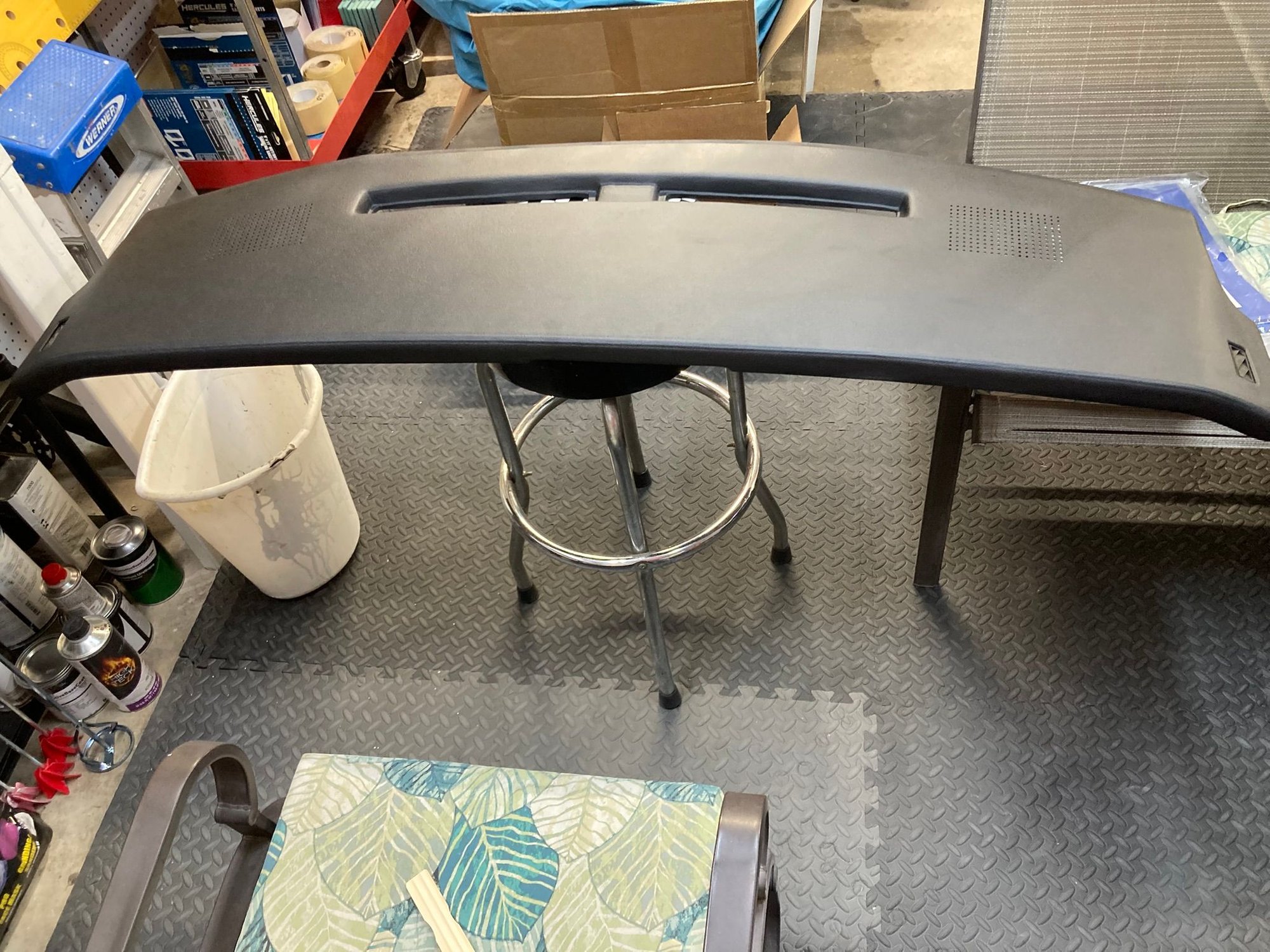 Hard to make out - but the speaker perforation is crooked on the drivers side.