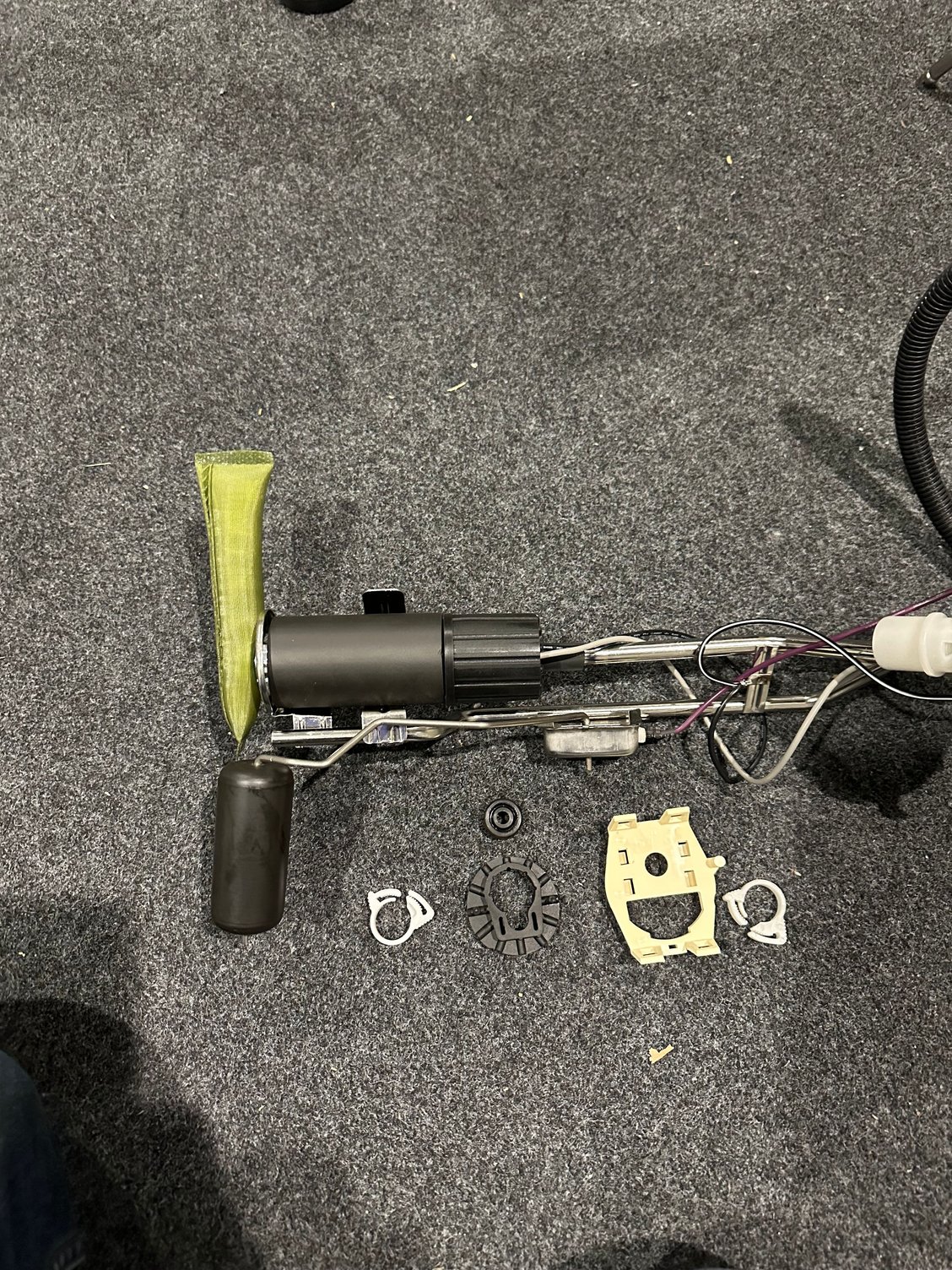 There was a rubber piece that looks like it goes on the top of the pump where the wire connection goes. Is that the right place for it ?