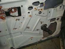 Drivers window regulator riveted back in place.
