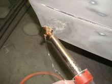 You feed the urethane rod through the hole in the foot.