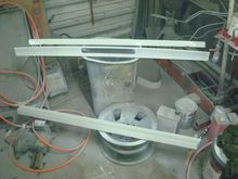 Center rear spoiler and door ground effects sealed in.