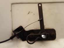 This is the correct hole to use for mounting the end of the cable. The outer hole was used for the earlier release that used rods and links.

Lon Salgren 
Top-Down Solutions